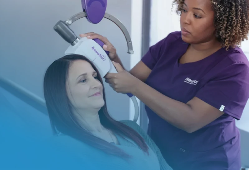 Services TMS Transcranial Magnetic Stimulation being used on client